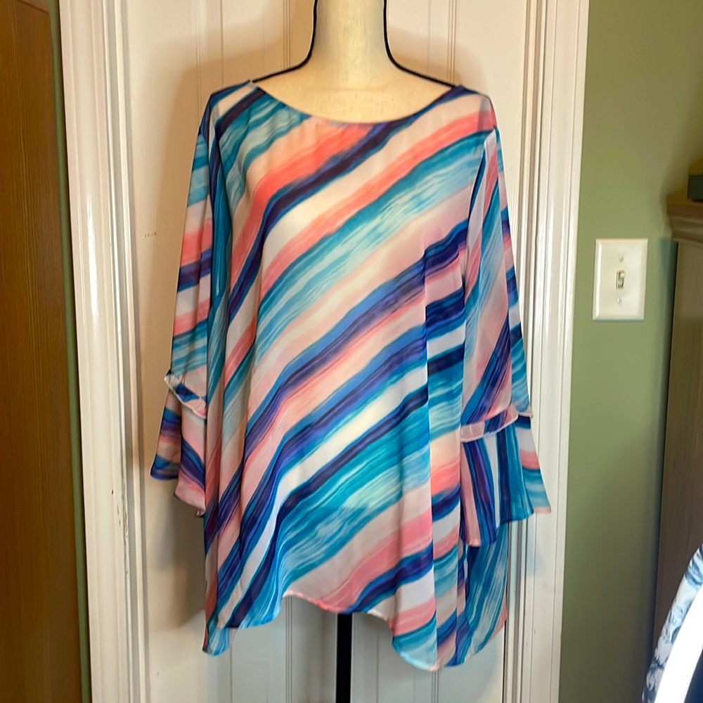 Lane Bryant blouse. Size 26. Sheer with bell sleeves. Keyhole back with button.